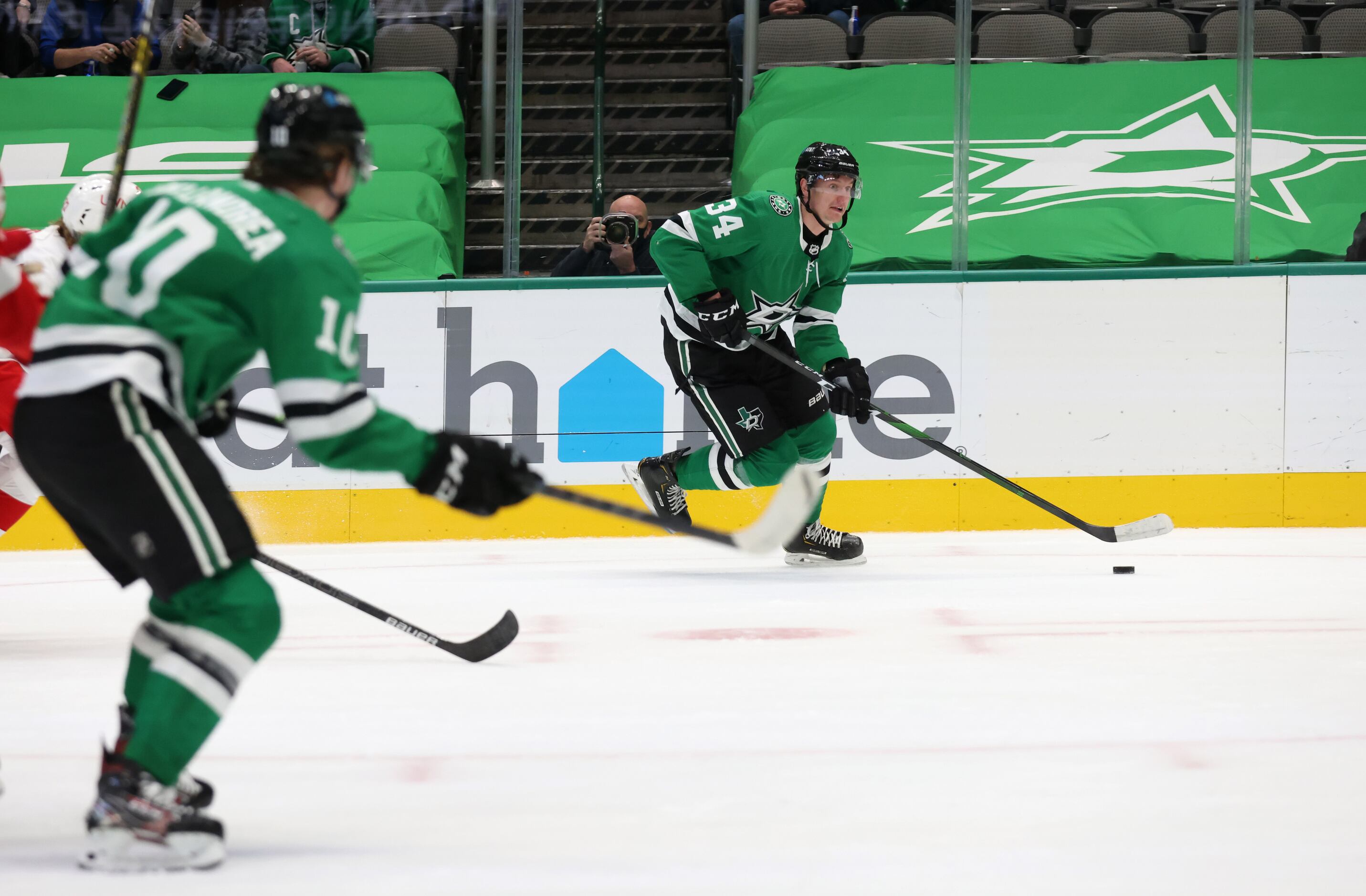 Dallas Stars right wing Denis Gurianov (34) advances the puck in a game against the Detroit...