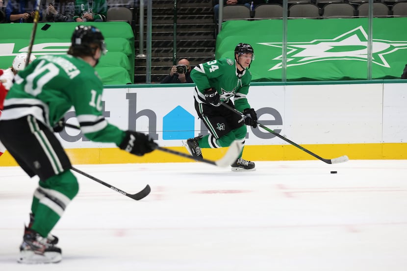 Dallas Stars right wing Denis Gurianov (34) advances the puck in a game against the Detroit...