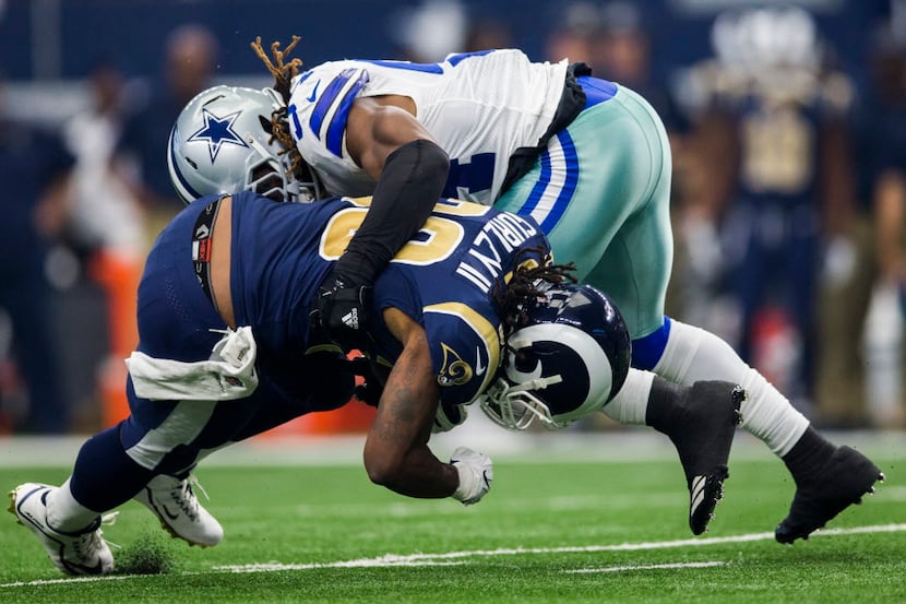 Dallas Cowboys outside linebacker Jaylon Smith (54) tackles Los Angeles Rams running back...