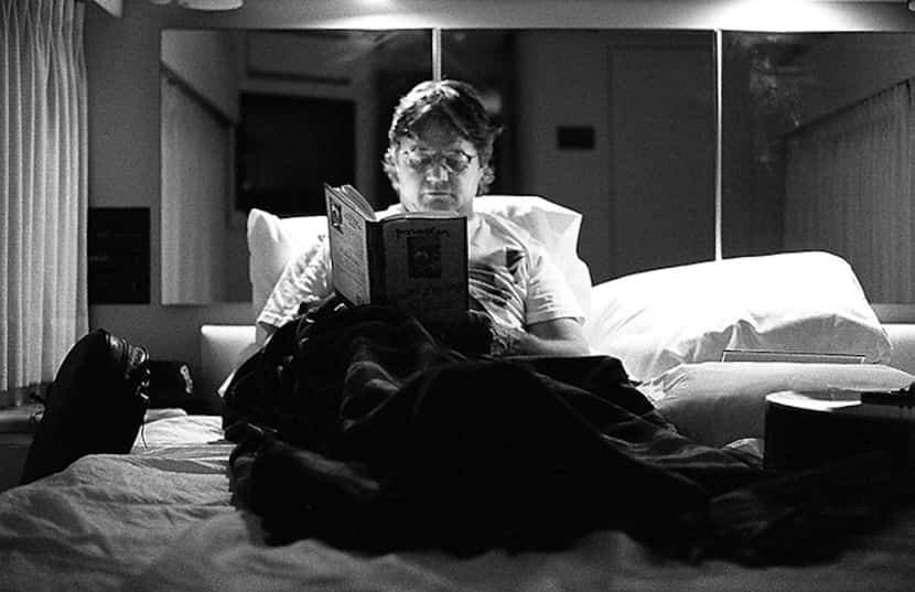  Steve Miller relaxes by reading in his private coach one hour before his sold out concert...