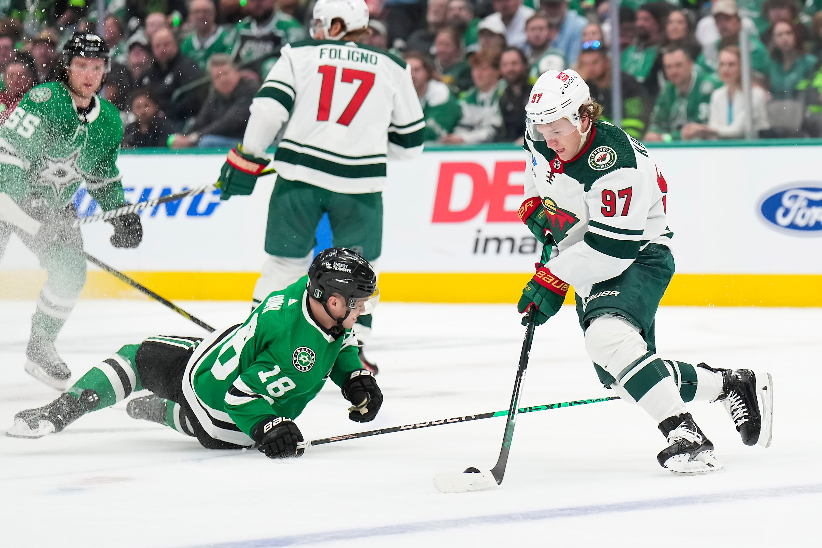 Minnesota Wild left wing Kirill Kaprizov (97) controls the puck as Dallas Stars center Max...