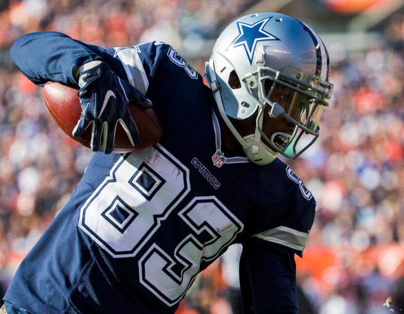 Dallas Cowboys wide receiver Terrance Williams (83) runs the ball during the second quarter...