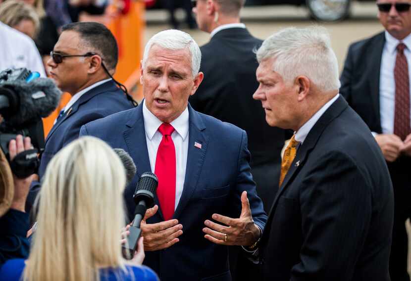 Vice President Mike Pence and U.S. Representative Pete Sessions answer questions from...