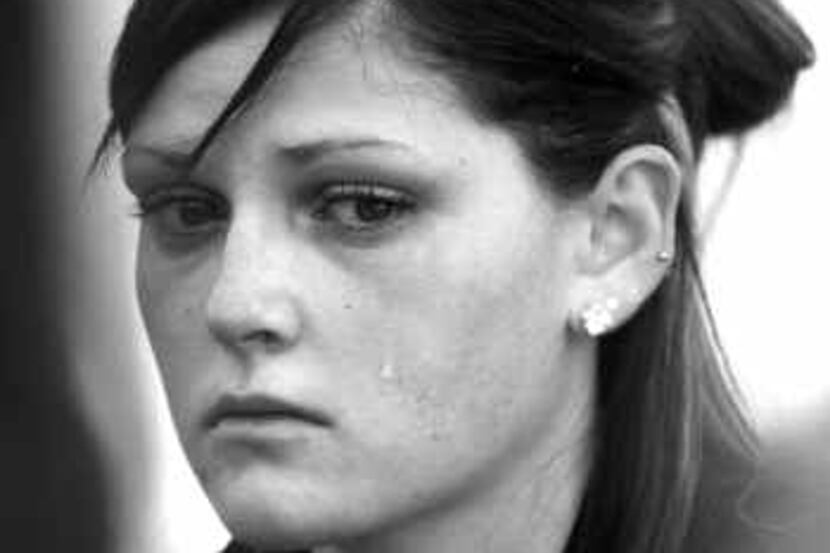  A tear streaked down Kristin Whittle's face during an anniversary ceremony at Fort Hood....