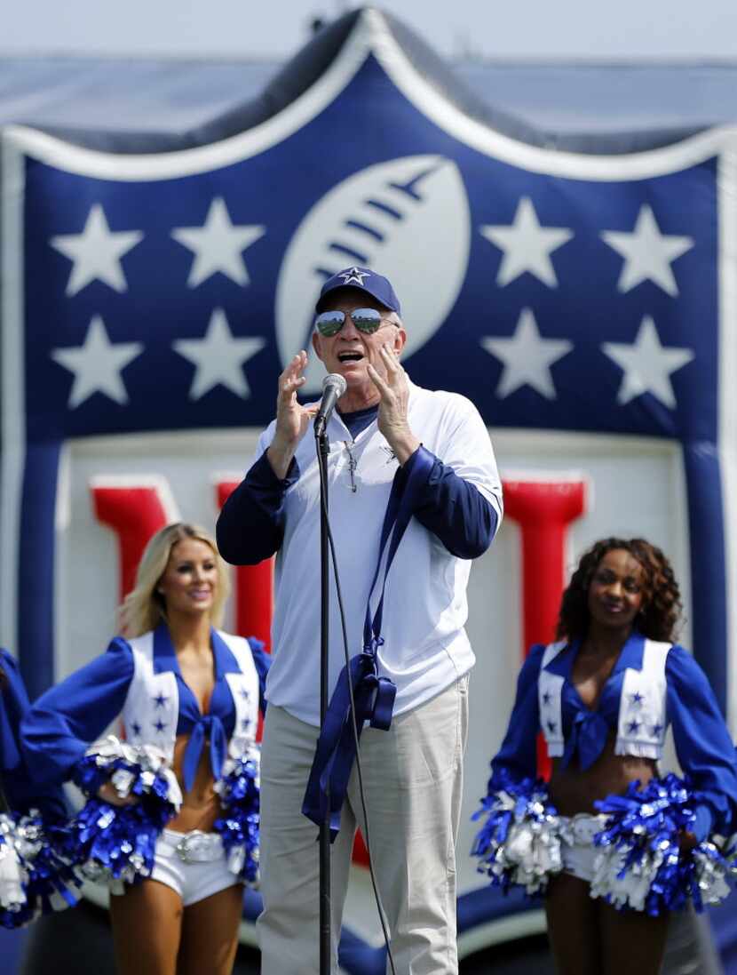 Dallas Cowboys owner Jerry Jones delivers opening remarks to the fans during the opening day...