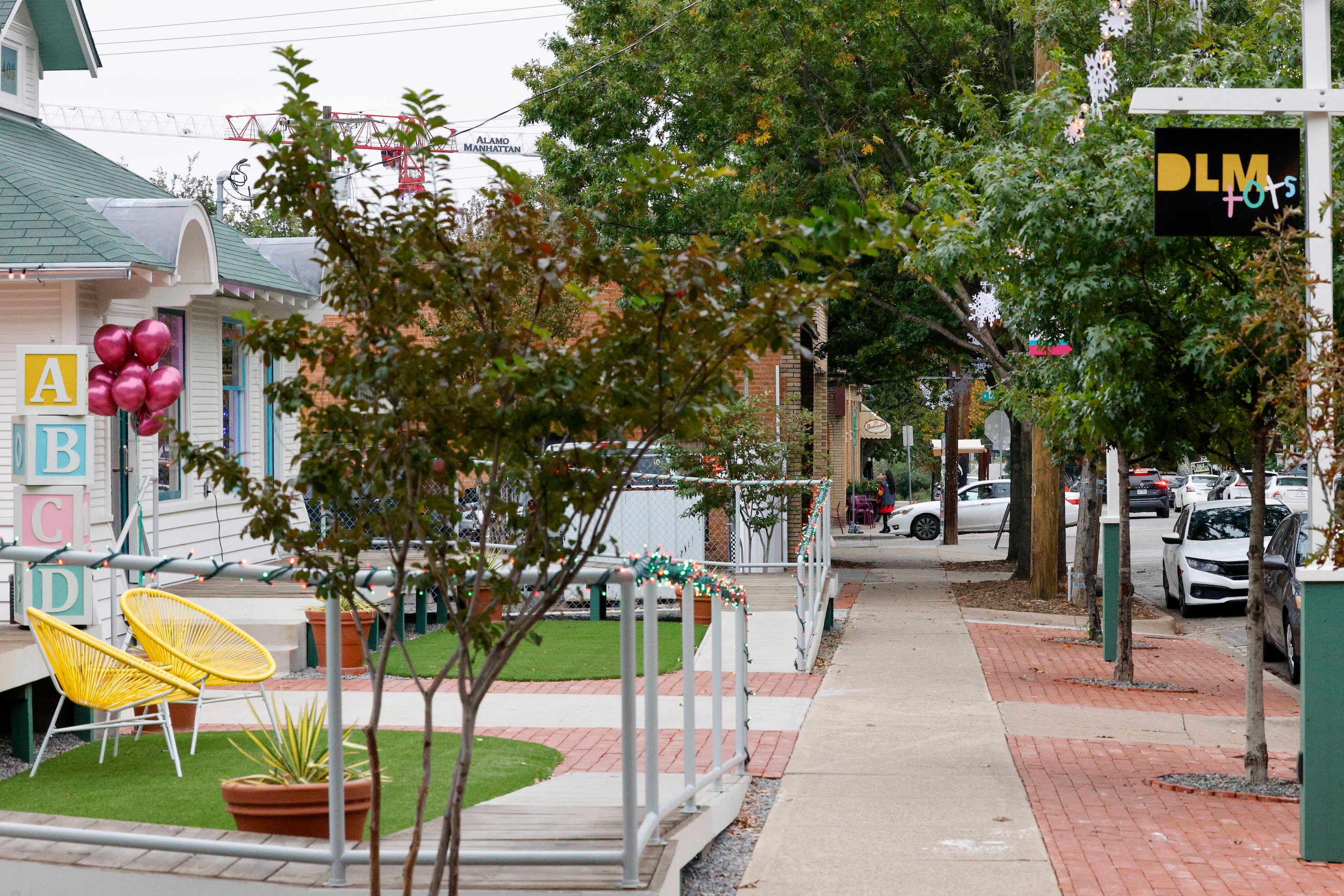 A pair of old houses redeveloped into a collection of small businesses are pictured along...