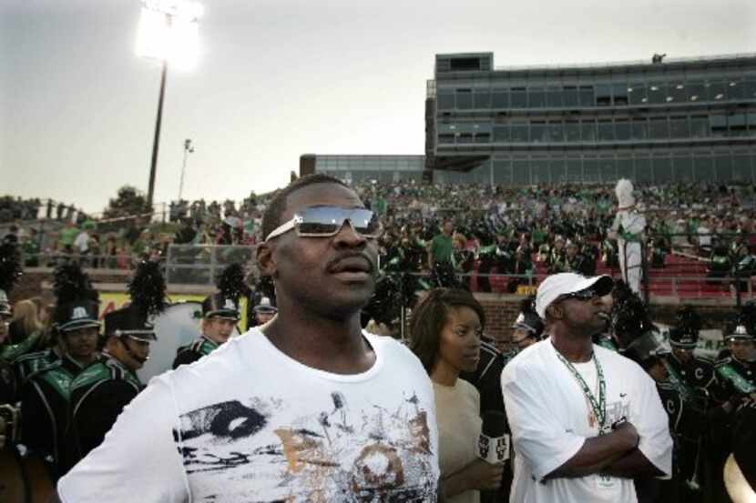 Former Dallas Cowboys widereceivers Michael Irvin (left) and Deion Sanders (right) watch...