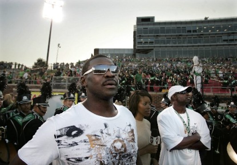 Former Dallas Cowboys widereceivers Michael Irvin (left) and Deion Sanders (right) watch...