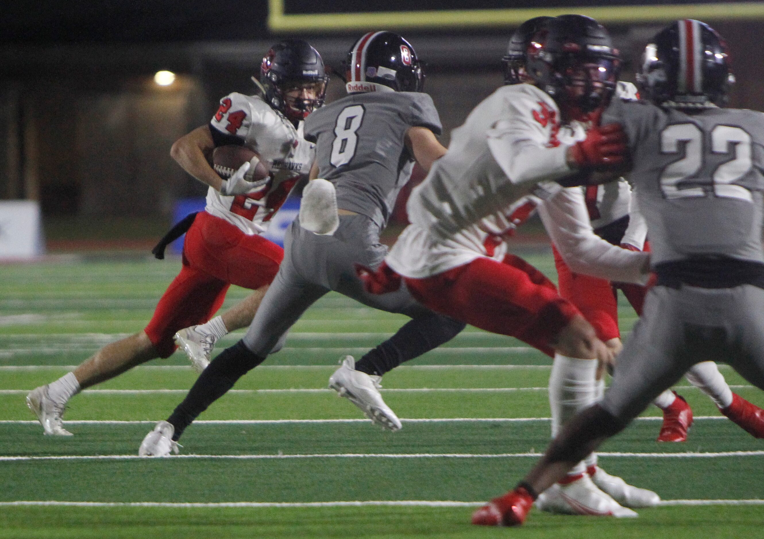 Frisco Liberty receiver Jack Bryan (24) eyes the defensive pursuit of Lovejoy defensive back...