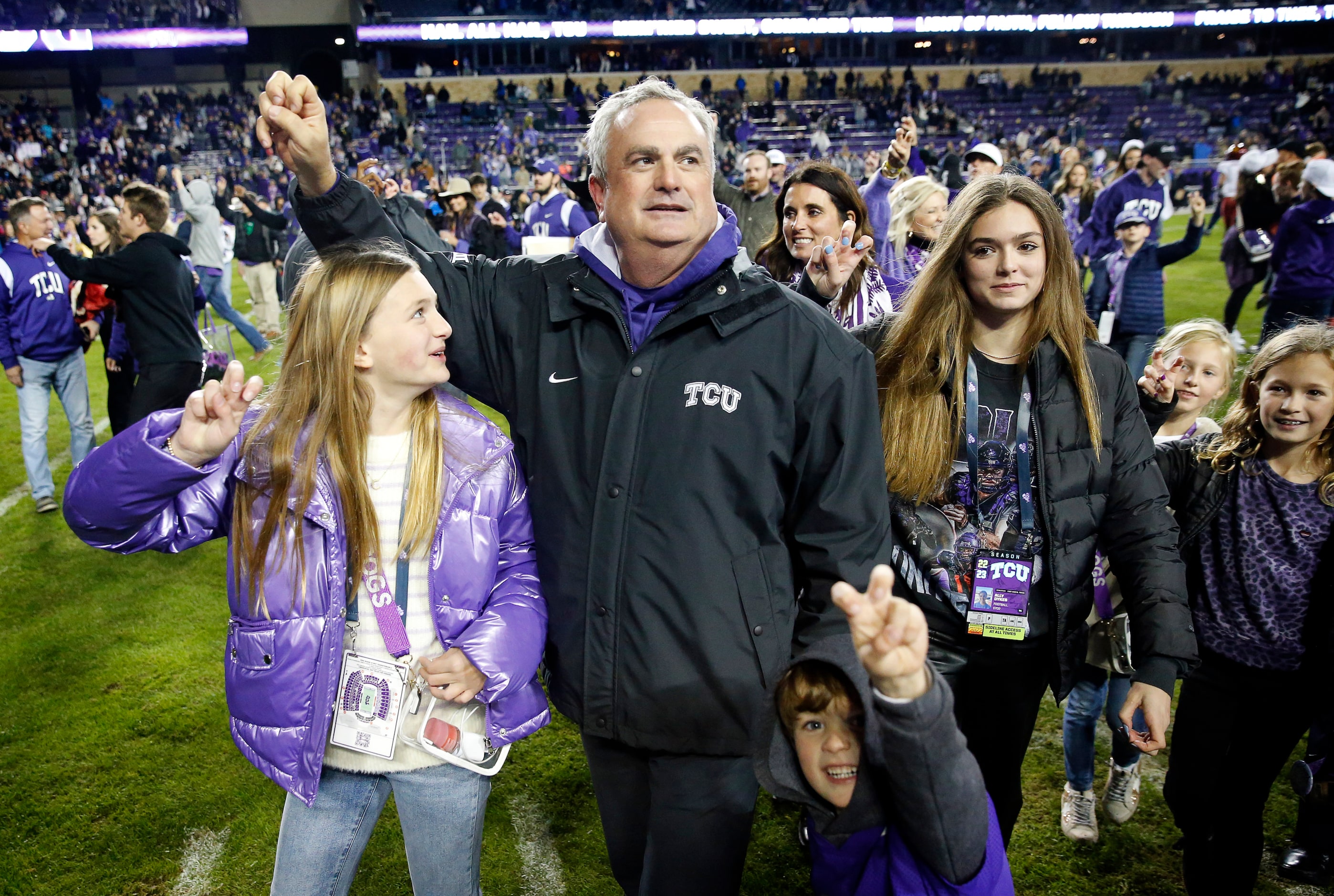 TCU Horned Frogs head coach Sonny Dykes celebrates the team's 62-14 win with family at Amon...