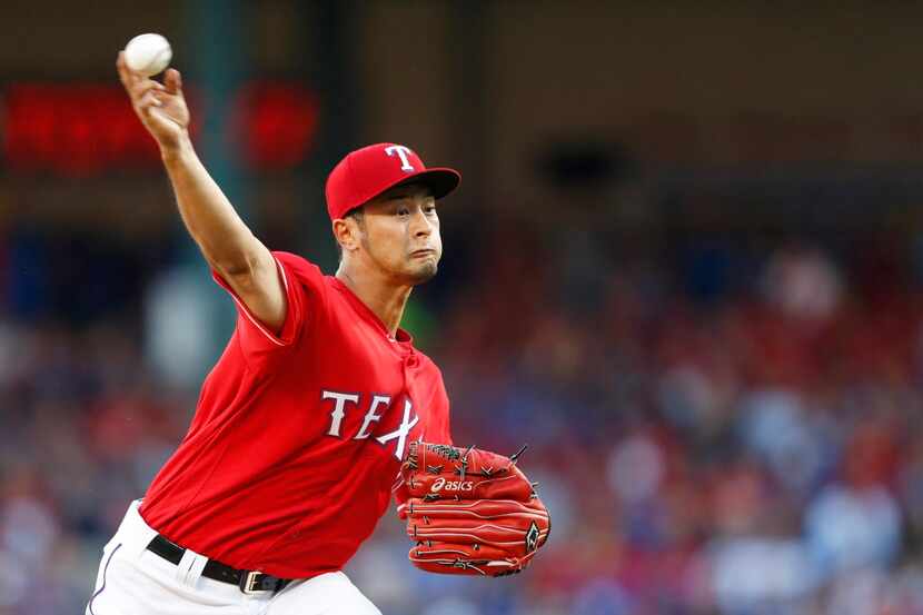 Texas Rangers starting pitcher Yu Darvish (11) pitches in the second inning of play in a...