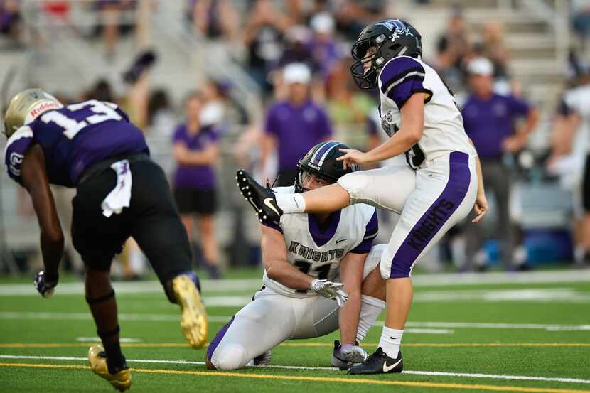 Independence kicker Brooke Cohen (99) scores on an extra-point field goal at Bronco Field.