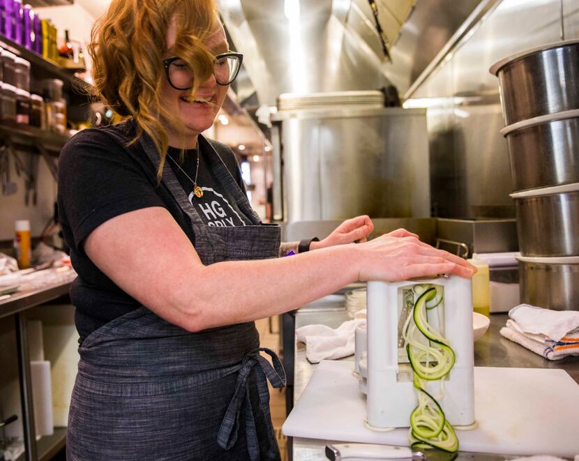 Chef Danyele McPherson makes a zucchini pasta bowl using a spiralizer on Thursday, March 31,...