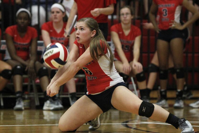 McKinney Boyd Lady Broncs defensive specialist Katelyn Bryant (6) makes a dig against the...