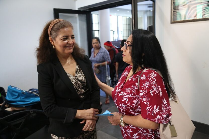 Dallas Area Interfaith organizer Socorro Perales (left) and churchgoer Maria De Jesus Fuerte...