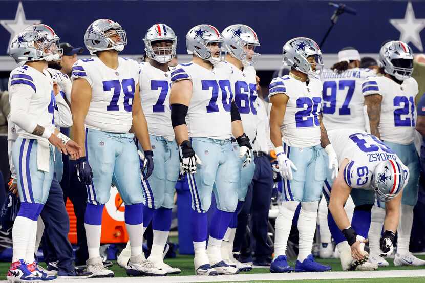 The Dallas Cowboys offense prepares to take the field against the Indianapolis Colts during...