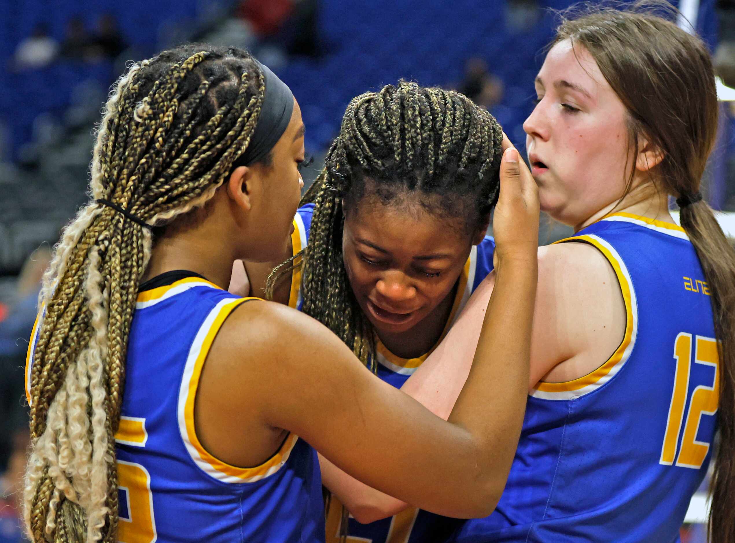 Sunnyvale Sidney Williams (5) consoles Sunnyvale Destiny Arinze (21) after they lost in...