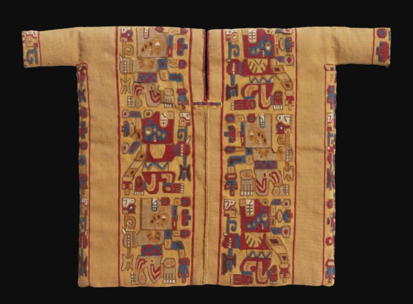Miniature tunic with weapon(?)-bearing creature in profile; camelid fiber and cotton from...