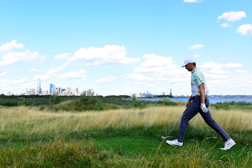 JERSEY CITY, NEW JERSEY - AUGUST 10: Jordan Spieth of the United States walks on the 18th...