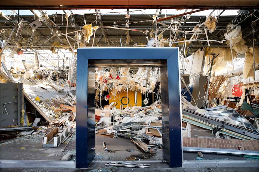 The interior of Interabang Books was demolished by a tornado in the Preston Royal shopping...