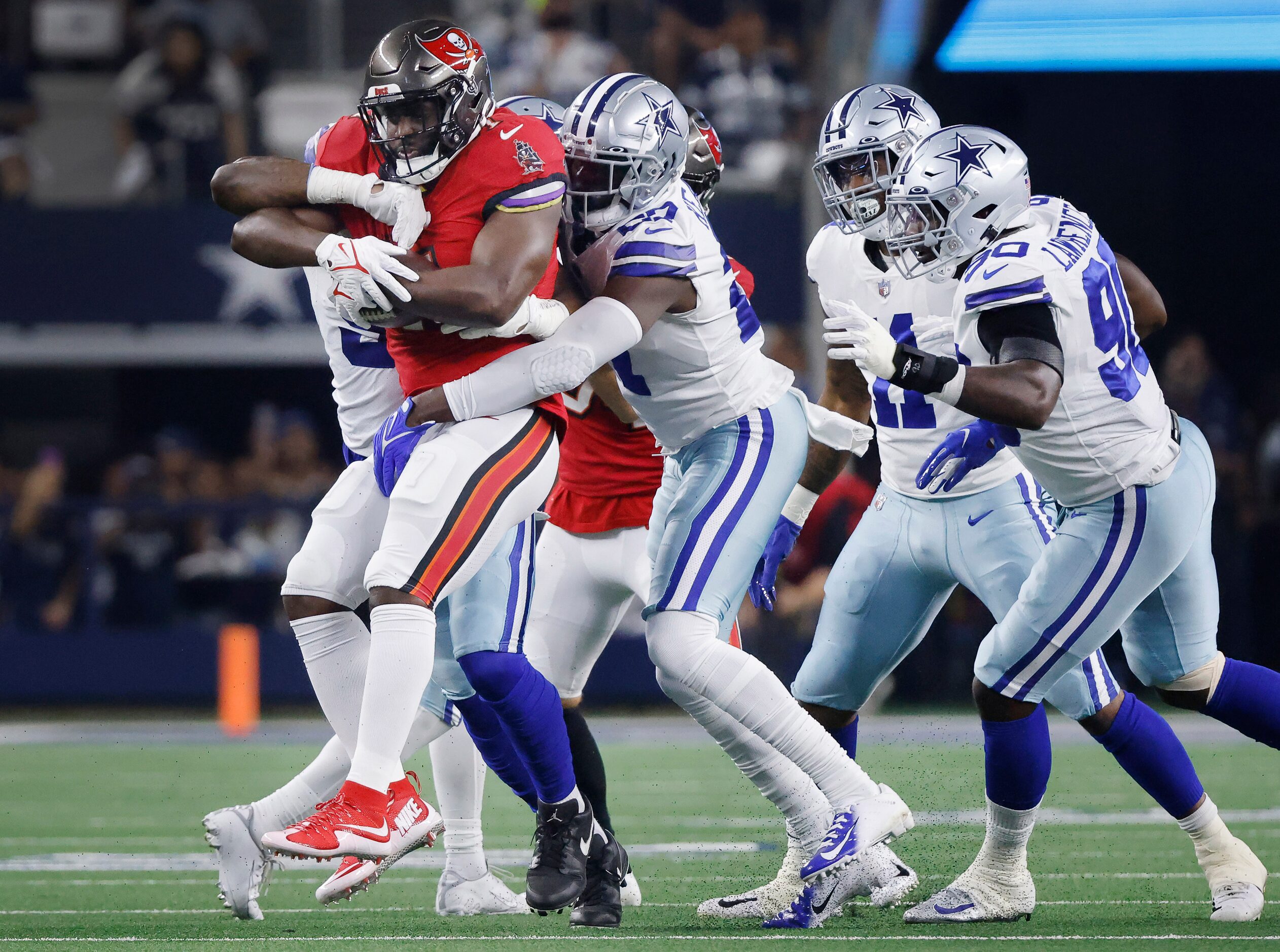 Dallas Cowboys safety Jayron Kearse (27) and the defense stop Tampa Bay Buccaneers running...