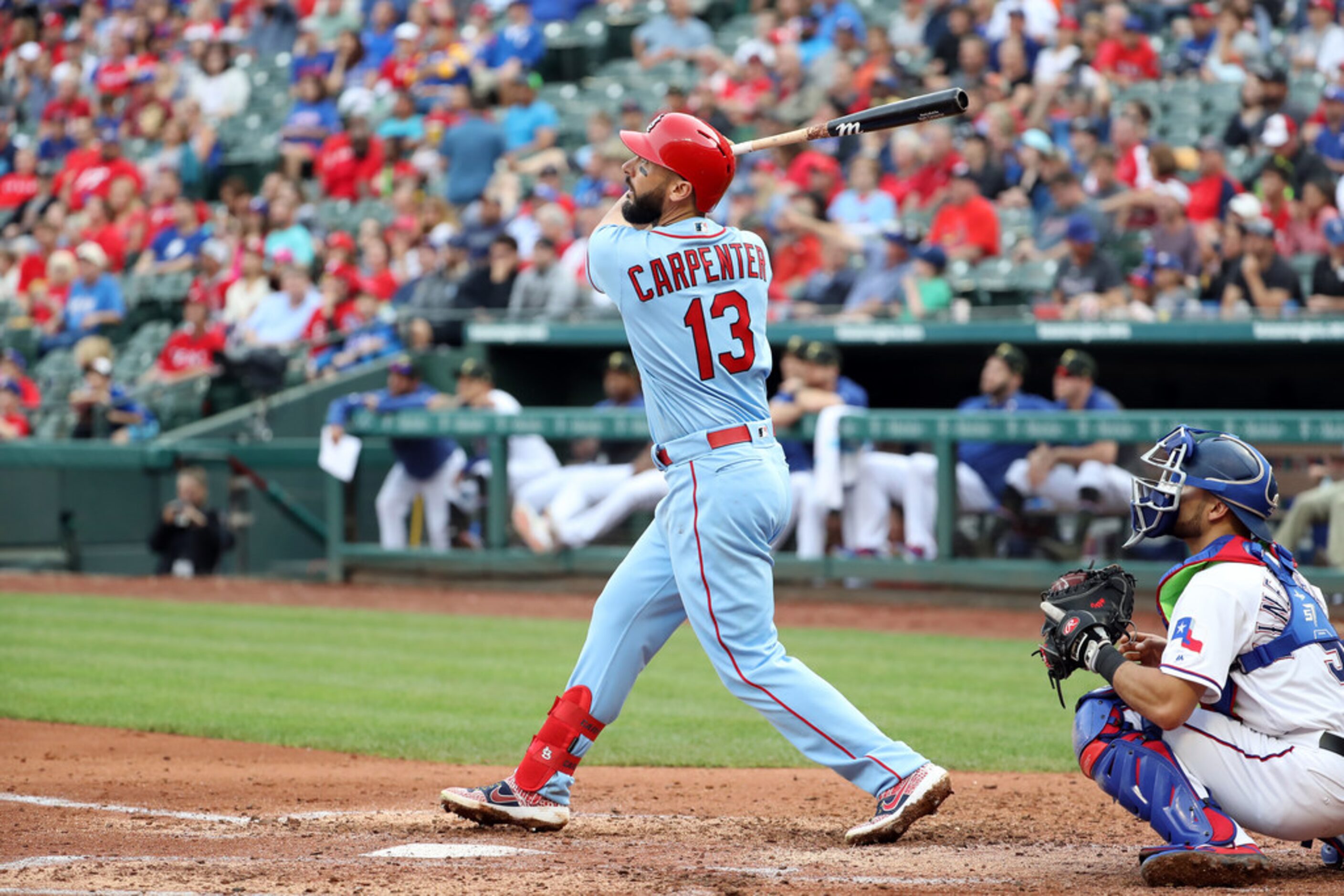 ARLINGTON, TEXAS - MAY 18:  Matt Carpenter #13 of the St. Louis Cardinals hits a rbi double...