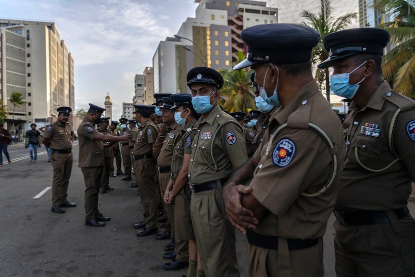Sri Lanka police men stood guard outside the official residence of president Gotabaya...