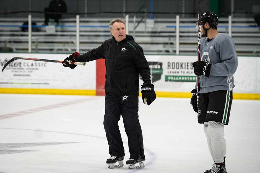 Stars interim coach Rick Bowness gives direction during a training camp practice on July 15,...