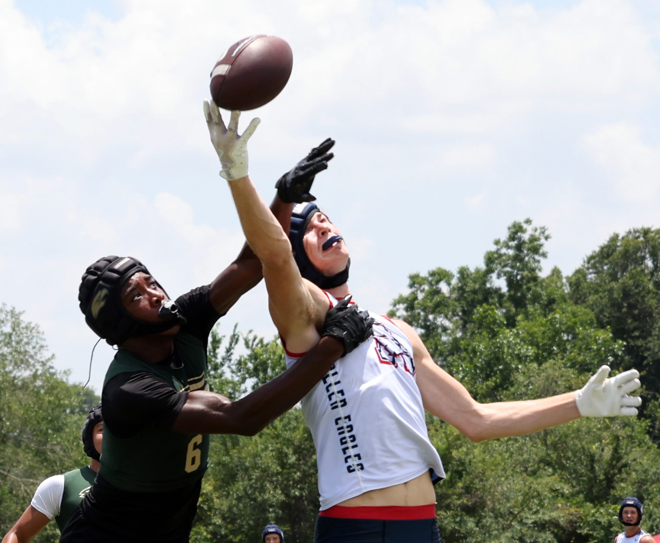 Allen receiver Somto Onoh (18) reaches for a long pass as he is challenged by a Cypress...