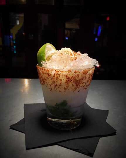 As the name indicates, Fogle's Elote En Vaso recreates an elote in a glass, rimmed with...