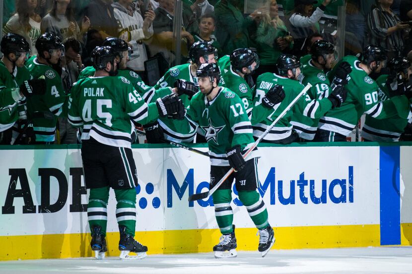 Dallas Stars center Andrew Cogliano (17) celebrates after a goal during the second period of...