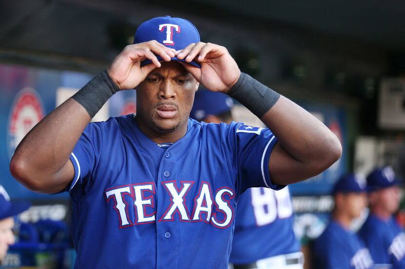 Texas Rangers third baseman Adrian Beltre (29) in the dugout before the start of a Major...