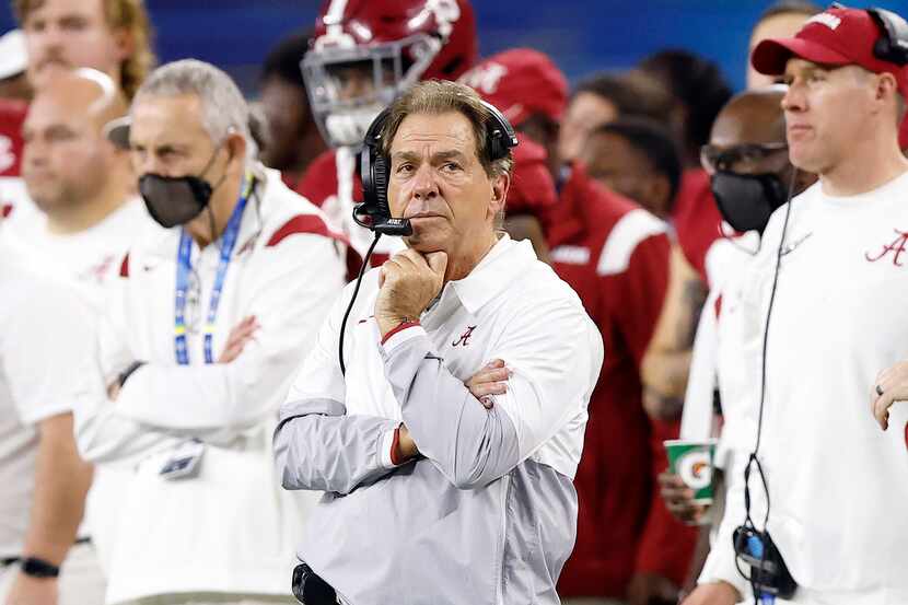 Alabama Crimson Tide head coach Nick Saban watches as the final minute ticks off their win...