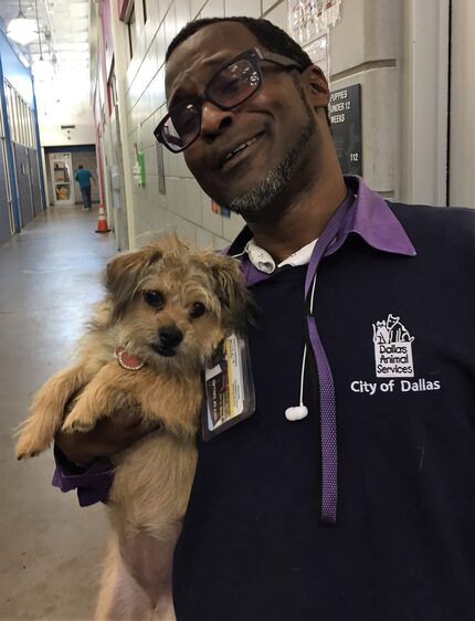 Jarrod Surrell and one of the shelter's available dogs.