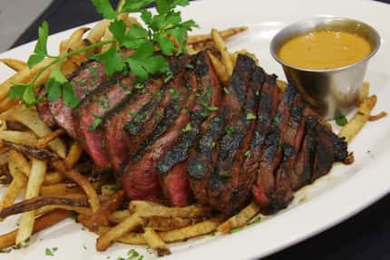 This 2019 file photo shows the London broil steak frites with voodoo sauce at Neighborhood...