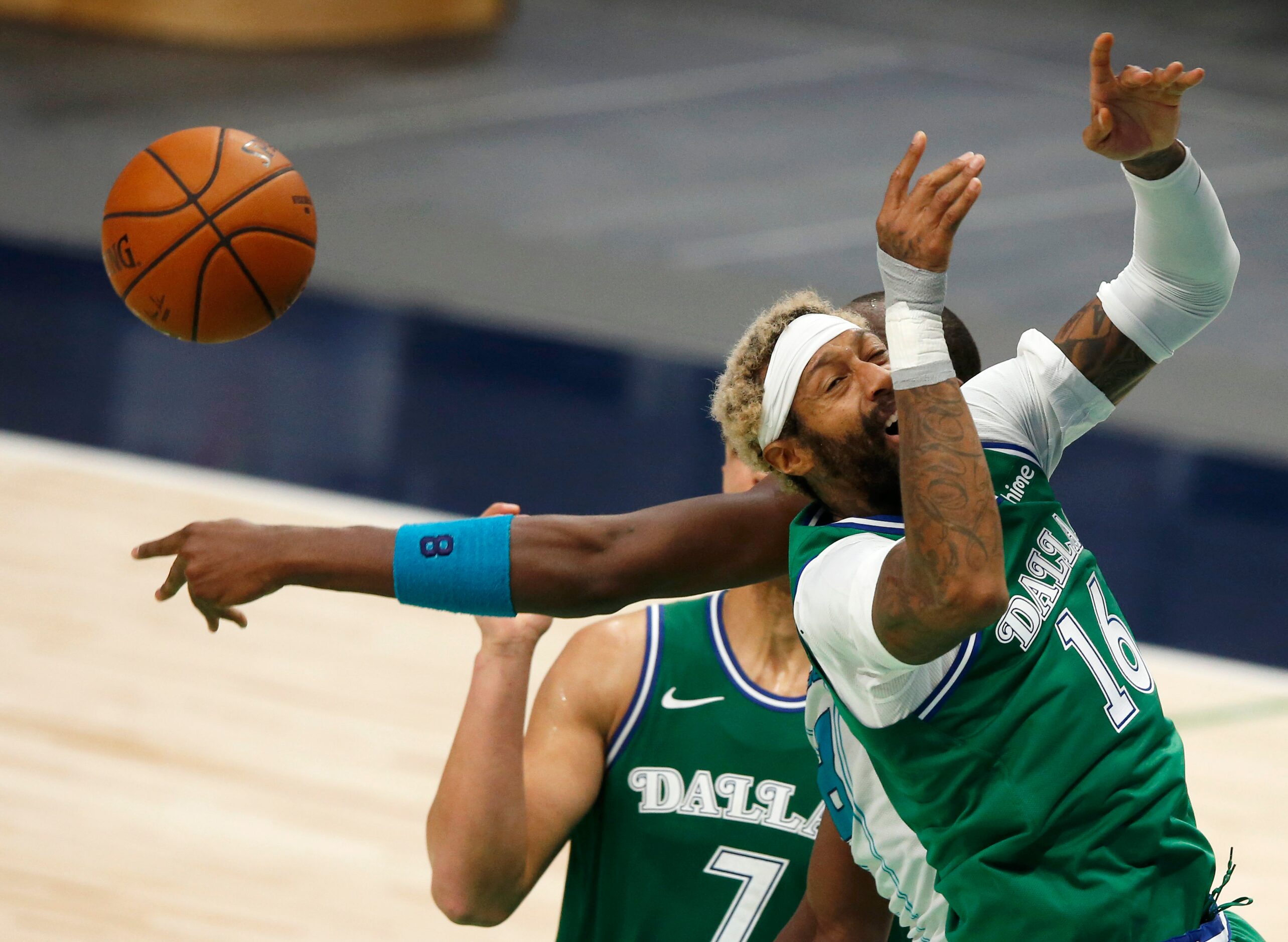 Charlotte Hornets center Bismack Biyombo (8) knocks the ball away from Dallas Mavericks...