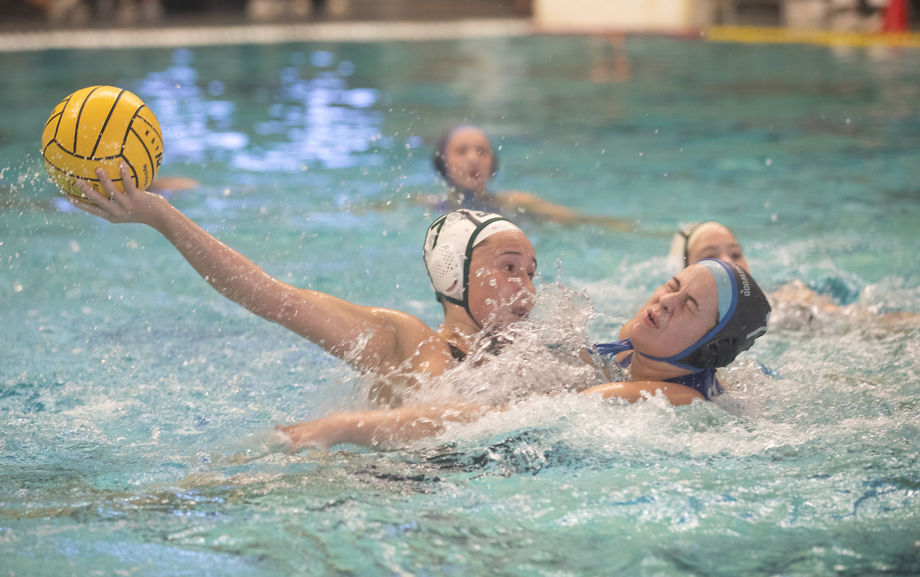 Southlake Carroll utility Sydney Rubin, looks for a shot over Clute Brazoswood utility Lexie...