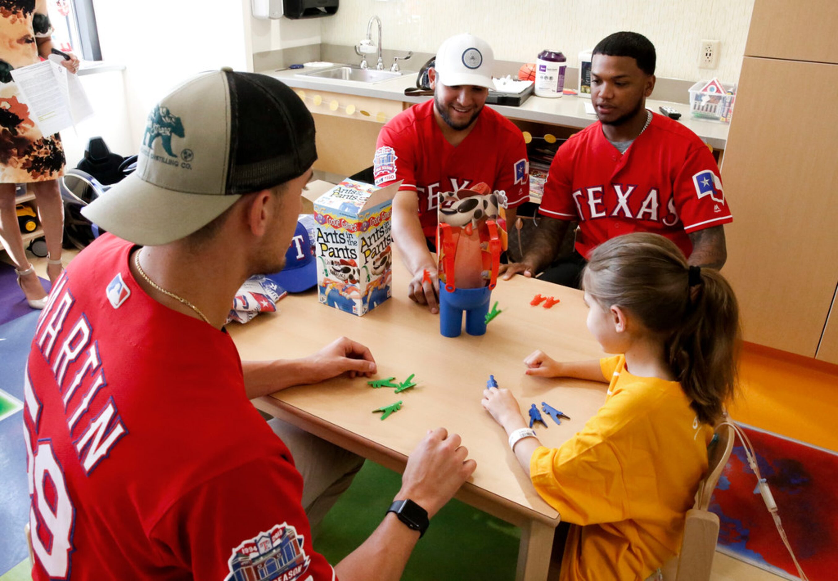 Texas Rangers Pitcher Brett Martin, left catcher Jose Trevino, outfielder Willie Calhoun...