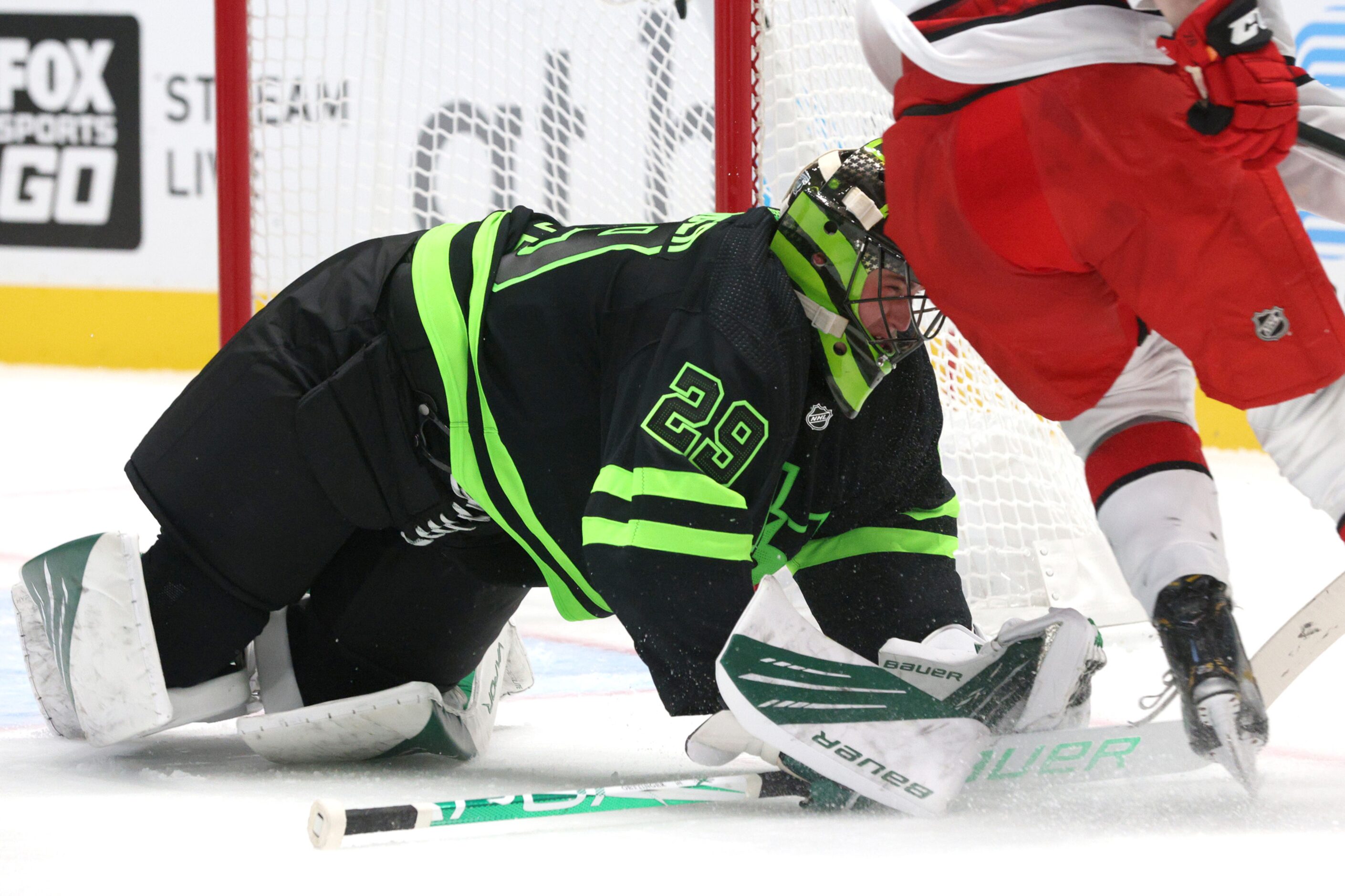 Dallas Stars goaltender Jake Oettinger (29) defends against the Carolina Hurricanes during...