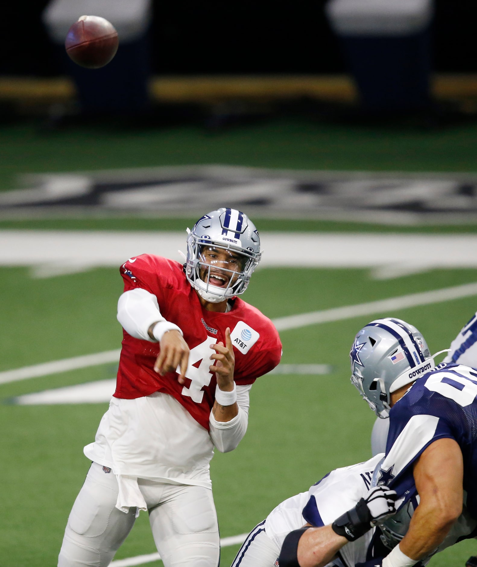 Dallas Cowboys quarterback Dak Prescott (4) attempts a pass during training camp inside the...