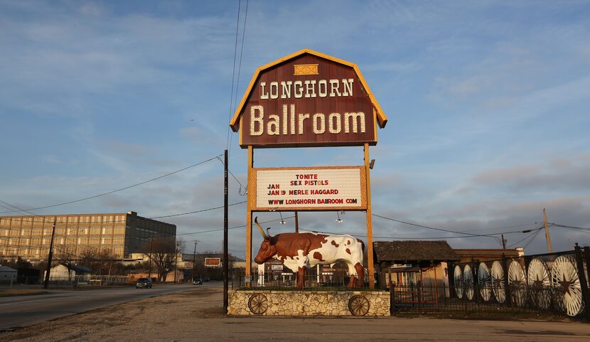 The sign outside of the Longhorn Ballroom in 2018 displays the names of the bands who were...