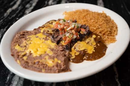 The Rick's Special at Casita in Dallas is two cheese enchiladas with chile con carne, topped...