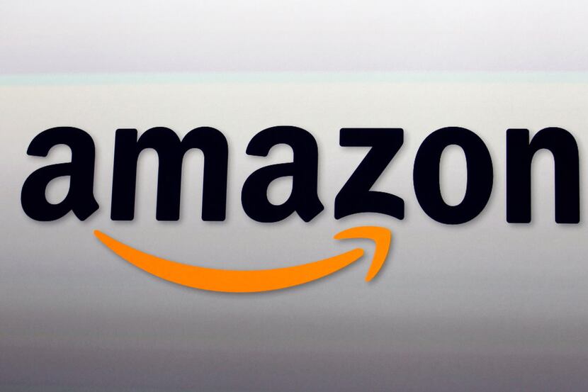 FILE - This Sept. 6, 2012, file photo, shows the Amazon logo in Santa Monica, Calif. Online...