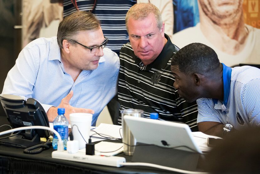 From left, Dallas Mavericks President of Basketball Operations & General Manager Donnie...