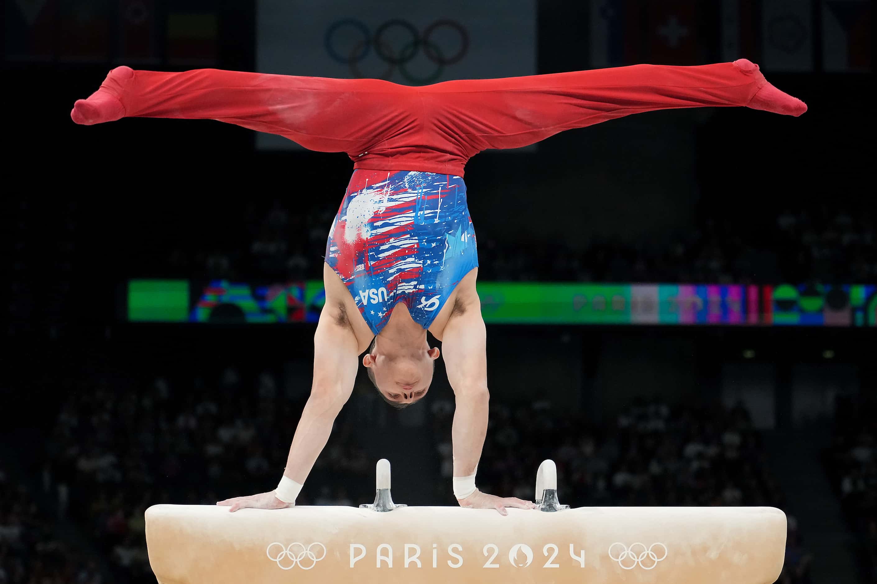 Paul Juda of the United States competes on the pommel horse during men’s gymnastics...