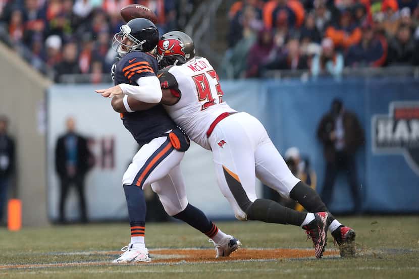 Nov 23, 2014; Chicago, IL, USA; Chicago Bears quarterback Jay Cutler (6) fumbles the ball as...