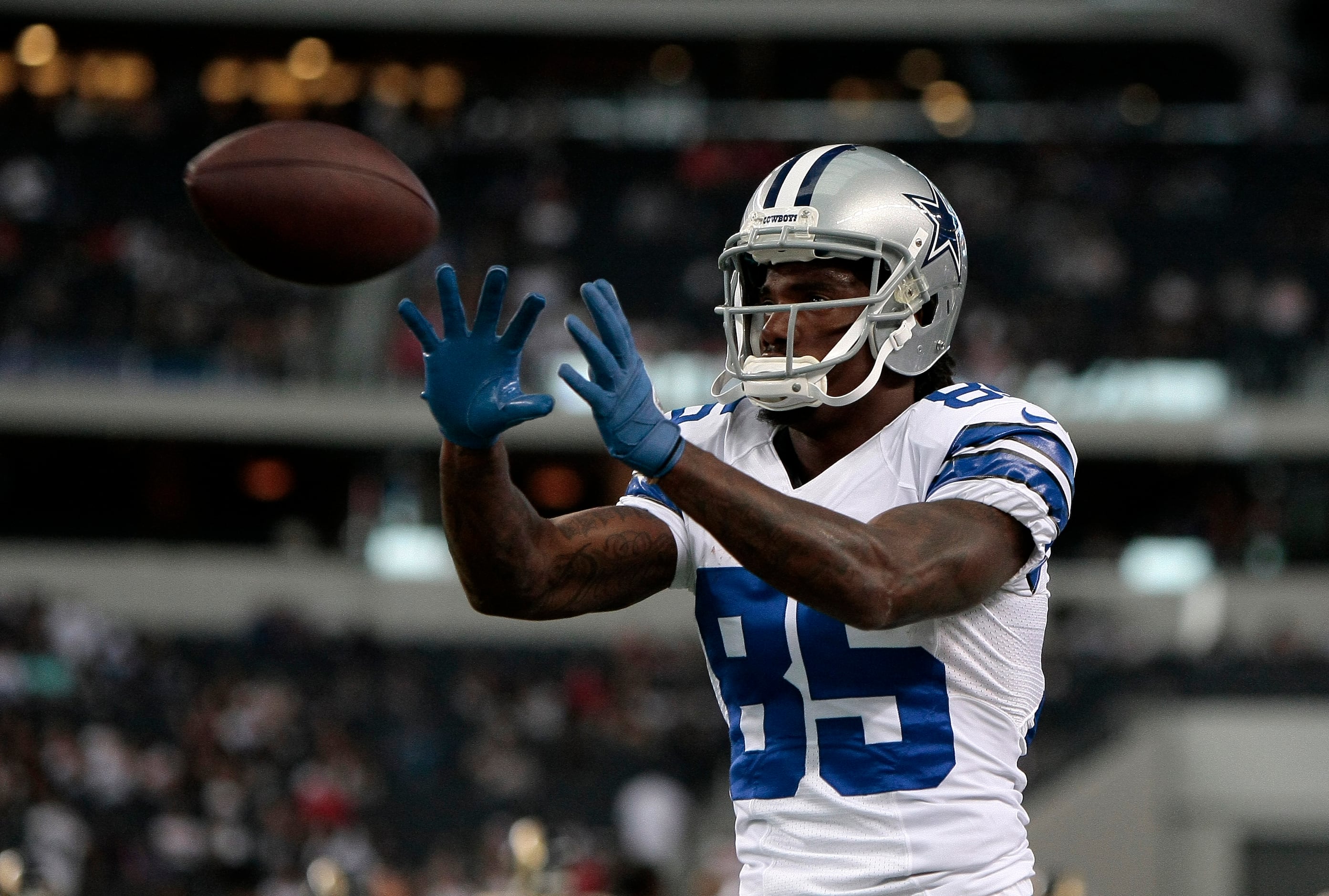 Dallas Cowboys quarterback Stephen McGee (7) tries to take the ball down  field in the first half of their pre-season footbal…