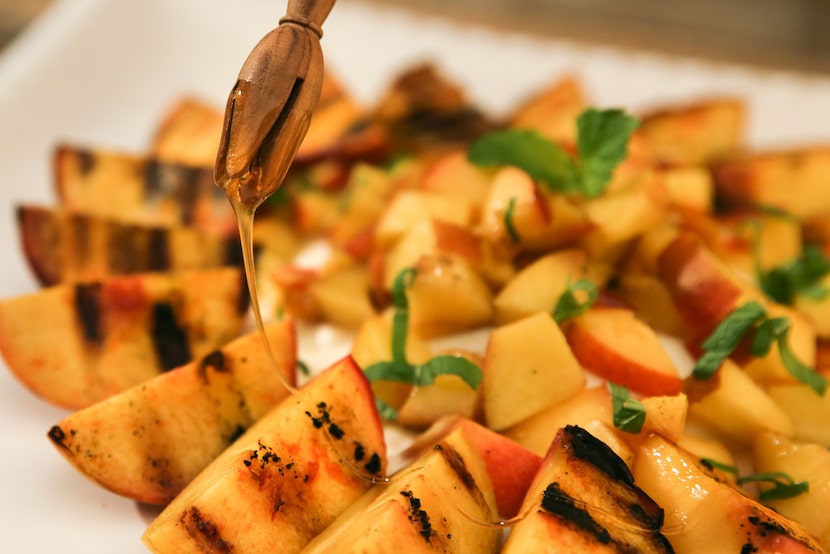 Burrata cheese with grilled peaches, mint and honey