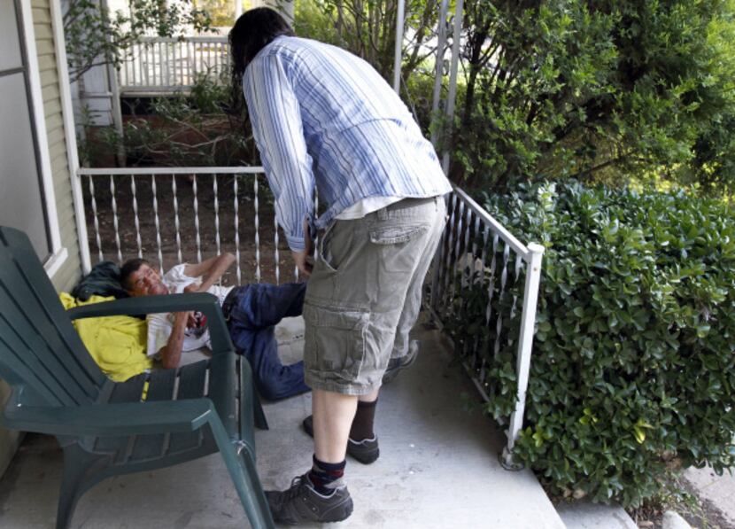 Grace often allows Wells to sleep on the porch of his East Dallas home, and sometimes washes...