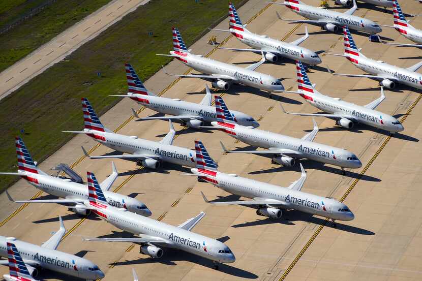 Aerial view of some of the 25 American Airlines aircraft parked on the ramp to the south of...